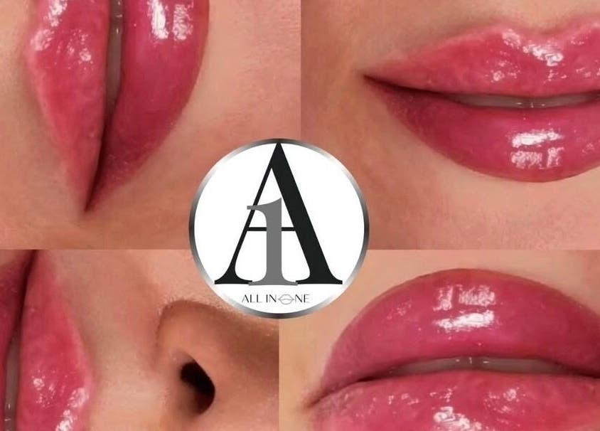 Glossy pink lips detail at All In One Aesthetics, Droitwich Spa, England, GB.