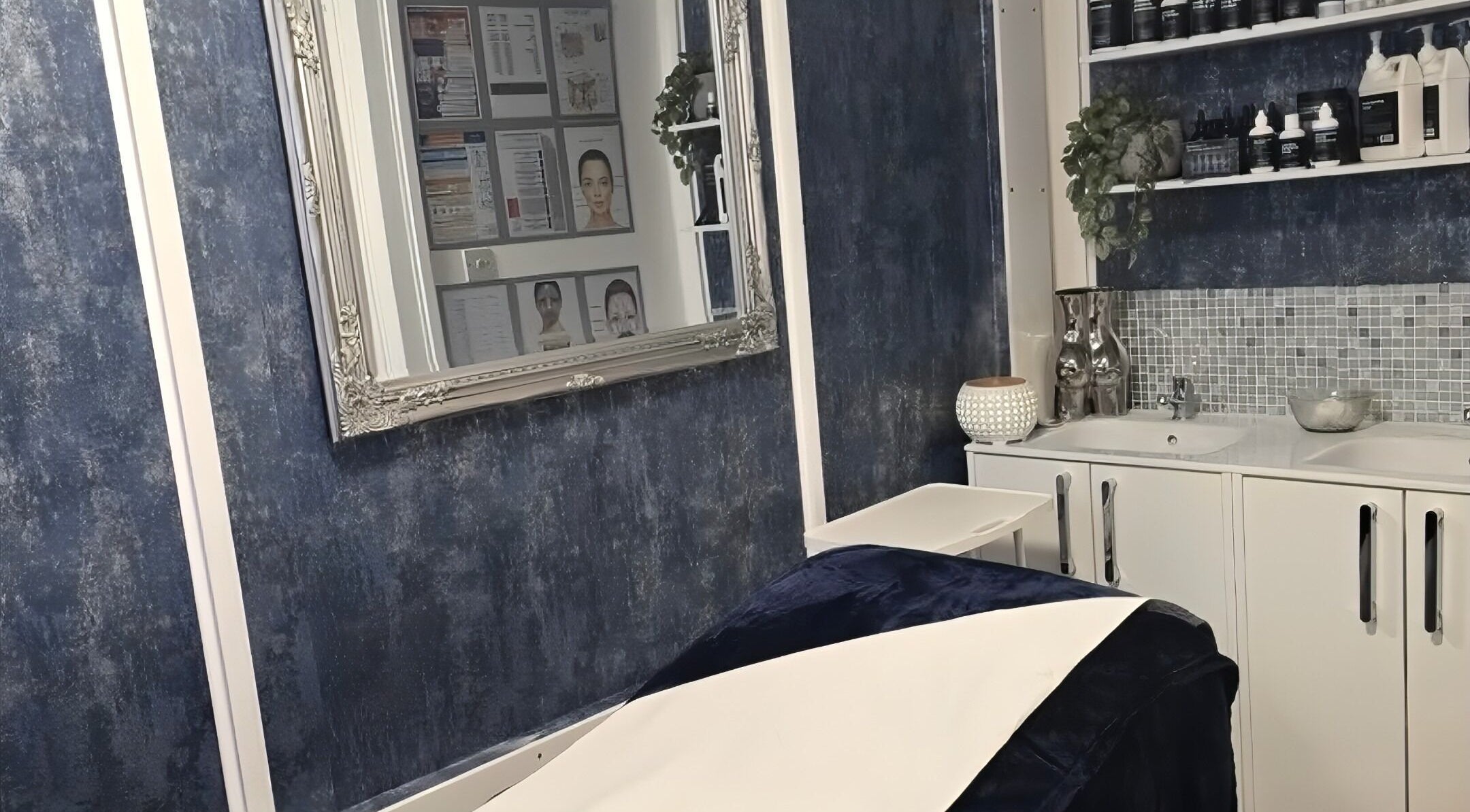 Elegant spa room at All In One Aesthetics, Droitwich Spa, England, GB with a modern sink and mirror setup.