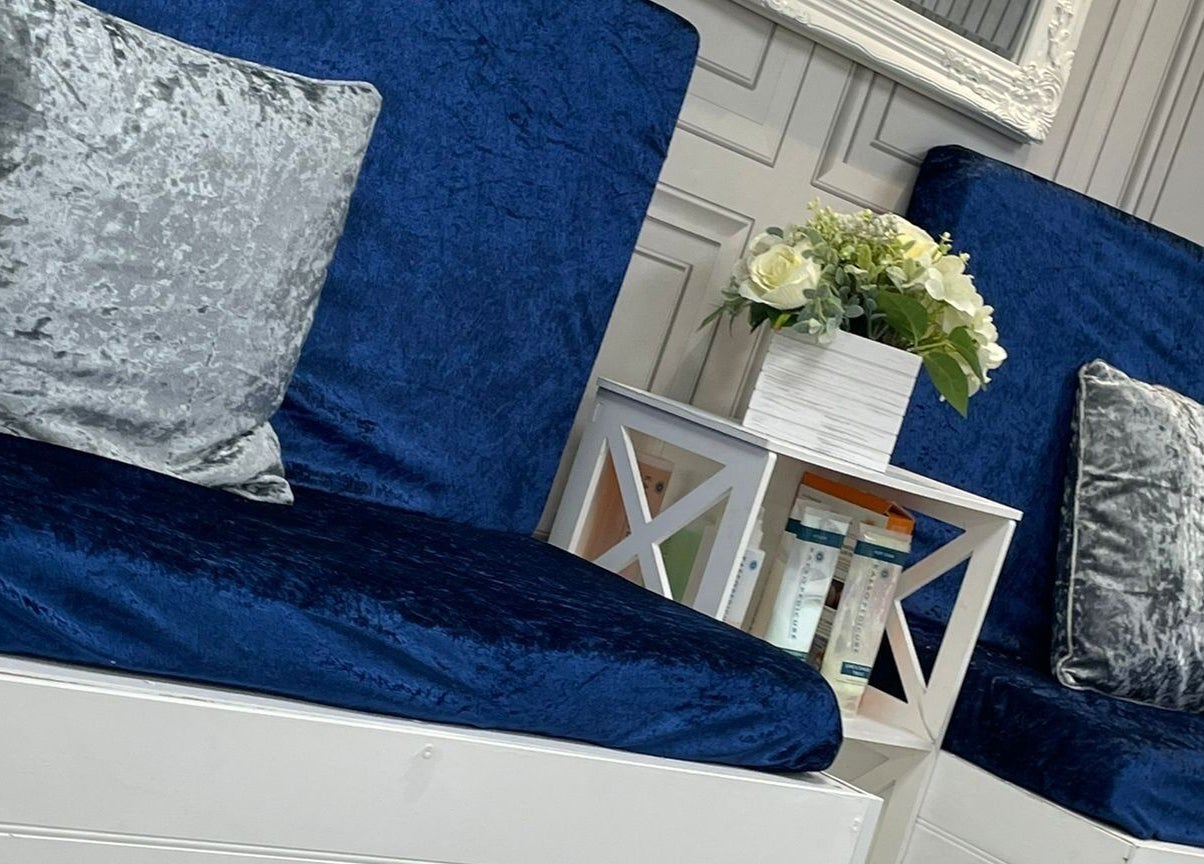 Luxurious blue velvet seating at All in One (Droitwich), Droitwich Spa, England, GB, enhances the elegant ambiance.
