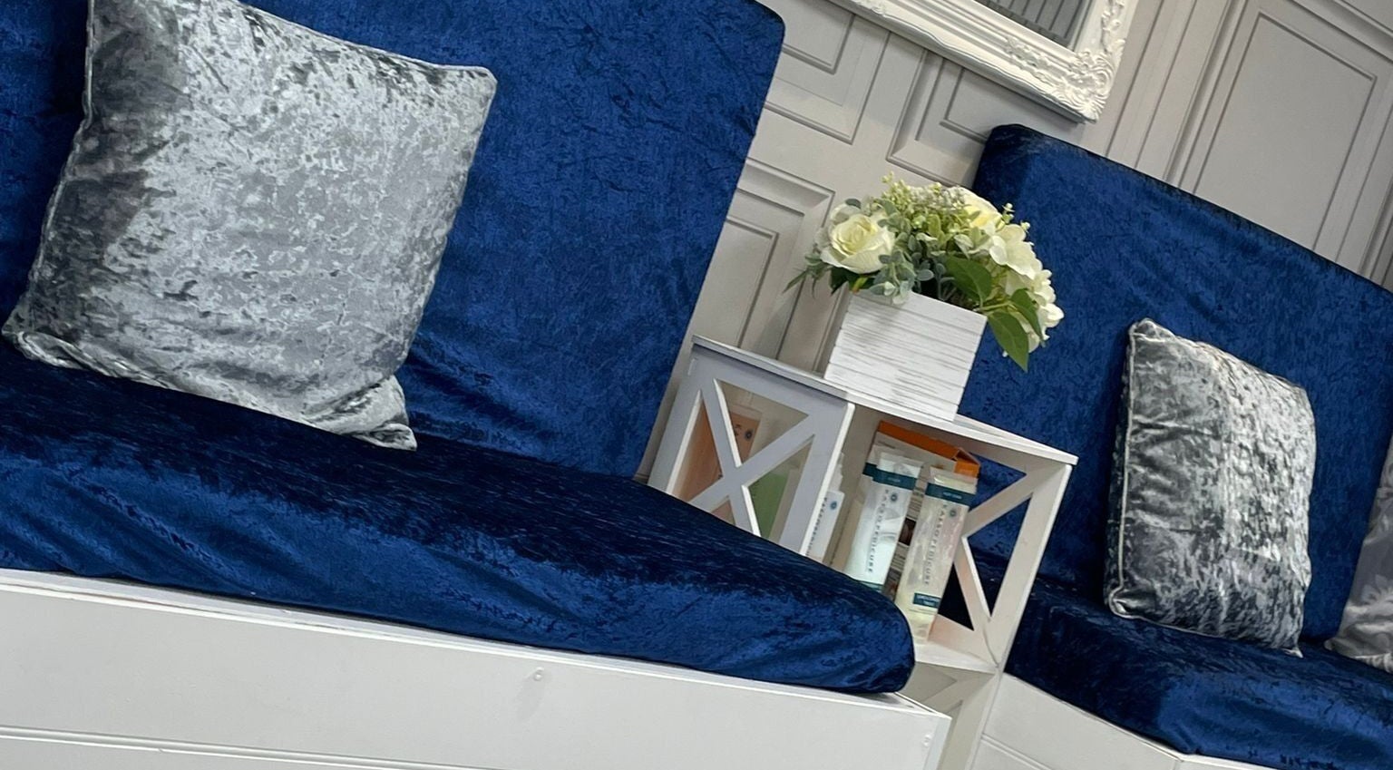 Luxurious blue velvet seating at All in One (Droitwich), Droitwich Spa, England, GB, enhances the elegant ambiance.