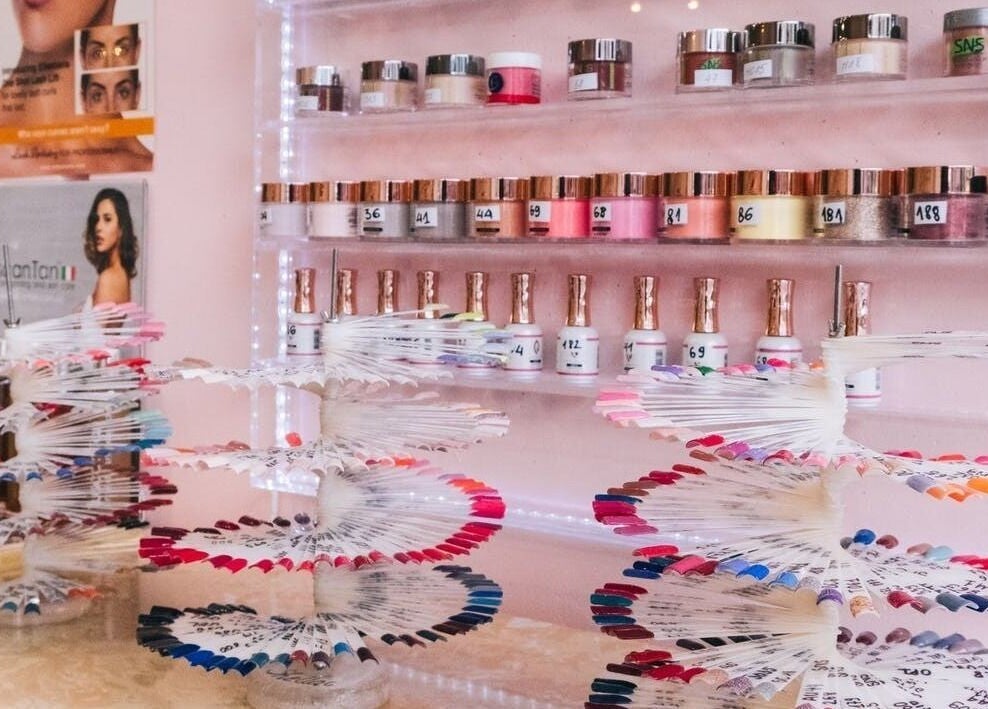 Colorful nail polish selection at Coco Nails, Melbourne, Victoria, AU showcasing a wide range of shades.
