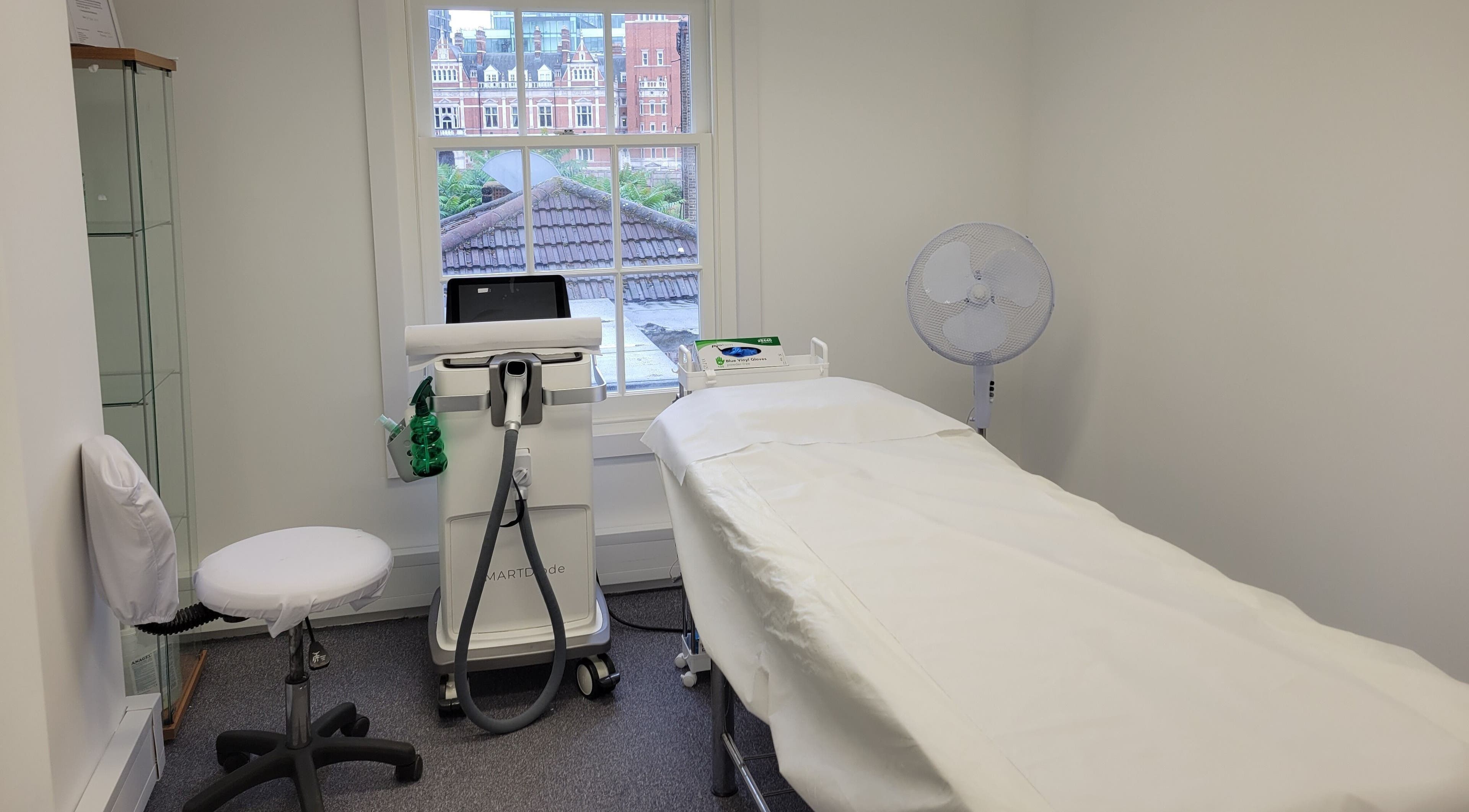 A pristine aesthetic treatment room at Laserlite Aesthetic Clinic, Croydon, England, GB with modern equipment and a tranquil ambiance.