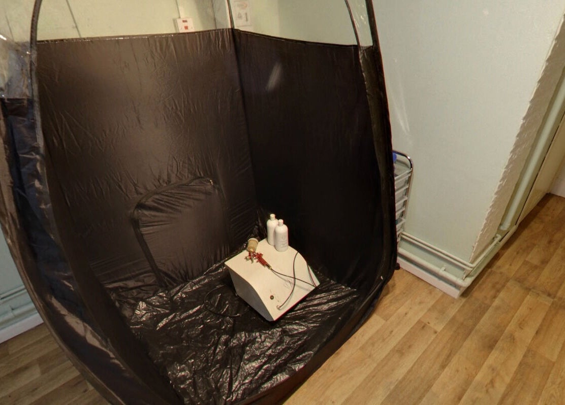 Interior spray booth at Laserlite Aesthetic Clinic, Croydon, England, GB, ready for tanning sessions.