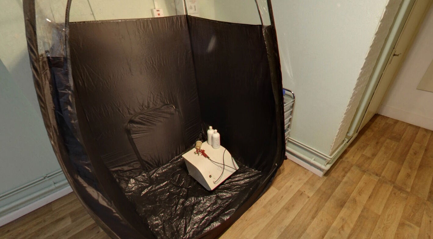 Interior spray booth at Laserlite Aesthetic Clinic, Croydon, England, GB, ready for tanning sessions.