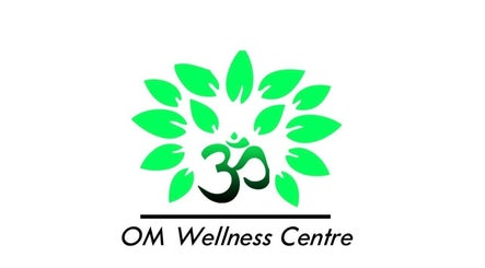 Green leaf and Om symbol logo of OM Wellness Spa in Bridgetown, Saint Michael, BB.