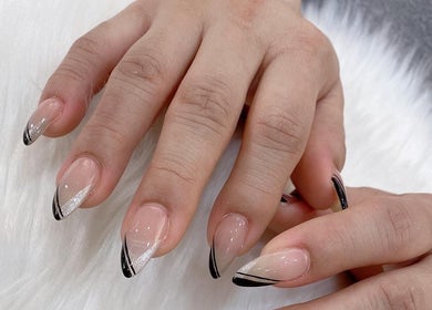 Stylish black-tipped manicure from Colorful Unicorn SG in Singapore, Singapore, SG.