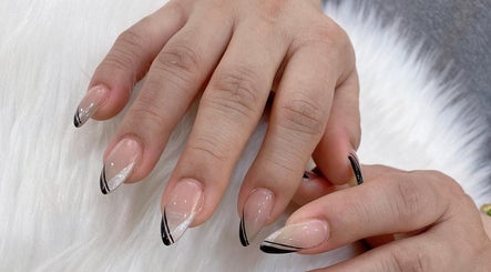 Stylish black-tipped manicure from Colorful Unicorn SG in Singapore, Singapore, SG.