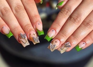 Stylish butterfly nail art with green tips at Chloe Studio Nail by Sophie, Garden Grove, California, US.