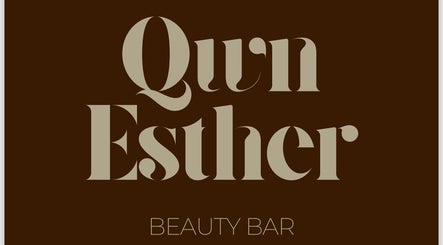 Logo for QWN Esther Beauty Bar in Willemstad, Curaçao, CW with stylish font on a dark background.