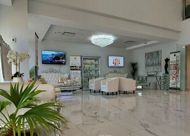 Luxurious interior of K-BTS Main Shop in Calgary, Alberta, CA with elegant seating and decor.