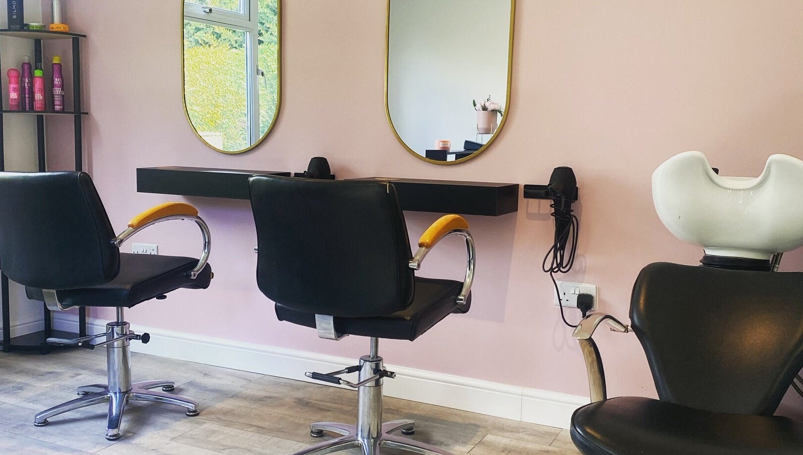 Modern salon chairs and mirrors at The Salon at No.3, Gloucester, England, GB, showcasing stylish design.