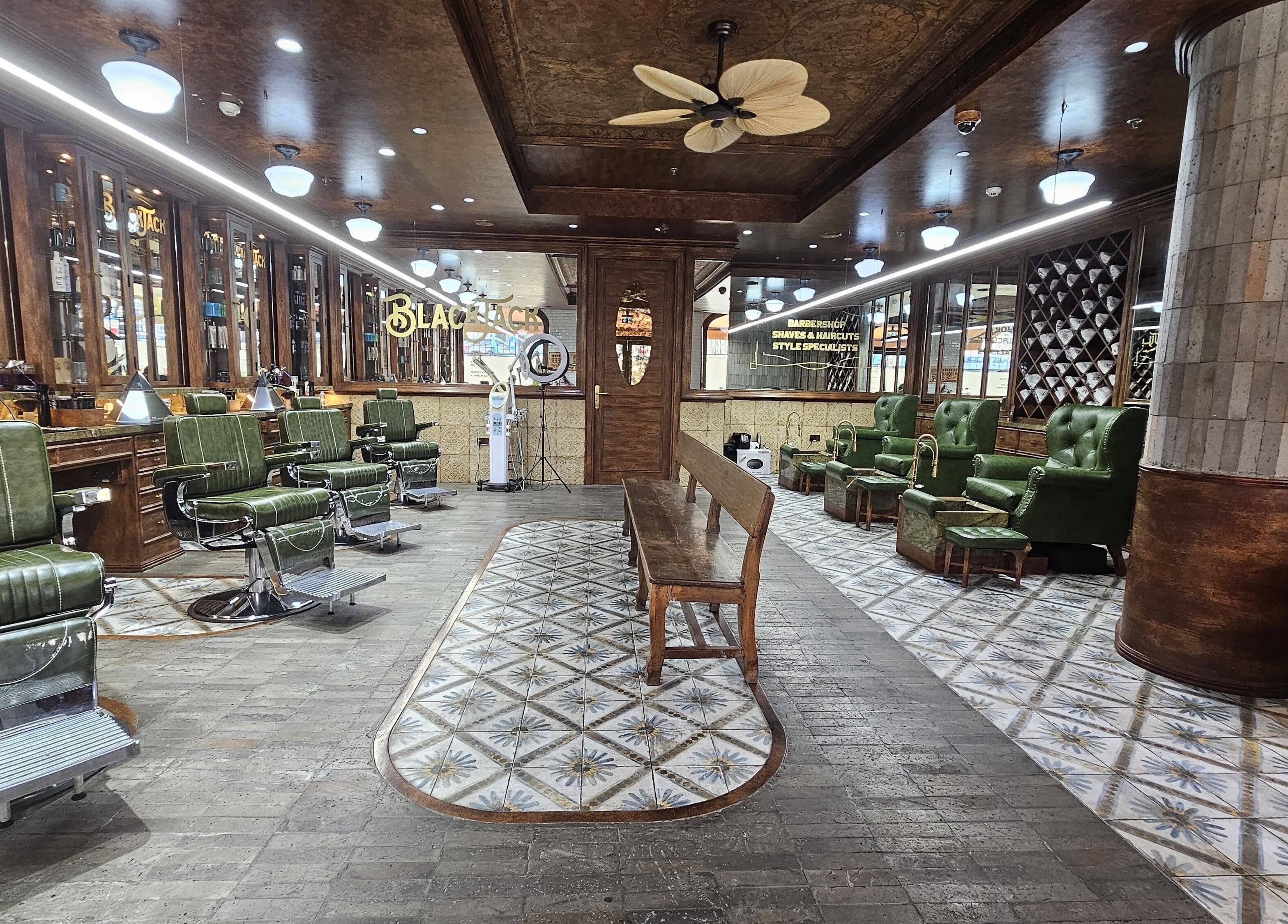 Interior of JBR BlackJack Barbershop with vintage chairs in Dubai, Dubai, AE.