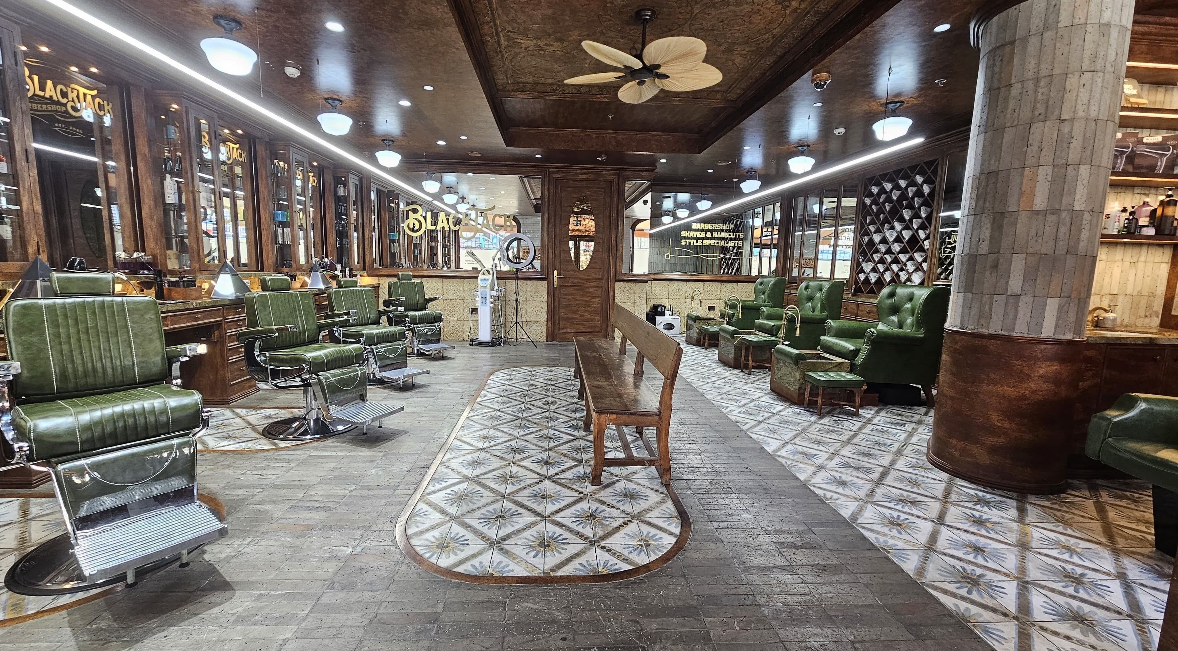 Interior of JBR BlackJack Barbershop with vintage chairs in Dubai, Dubai, AE.