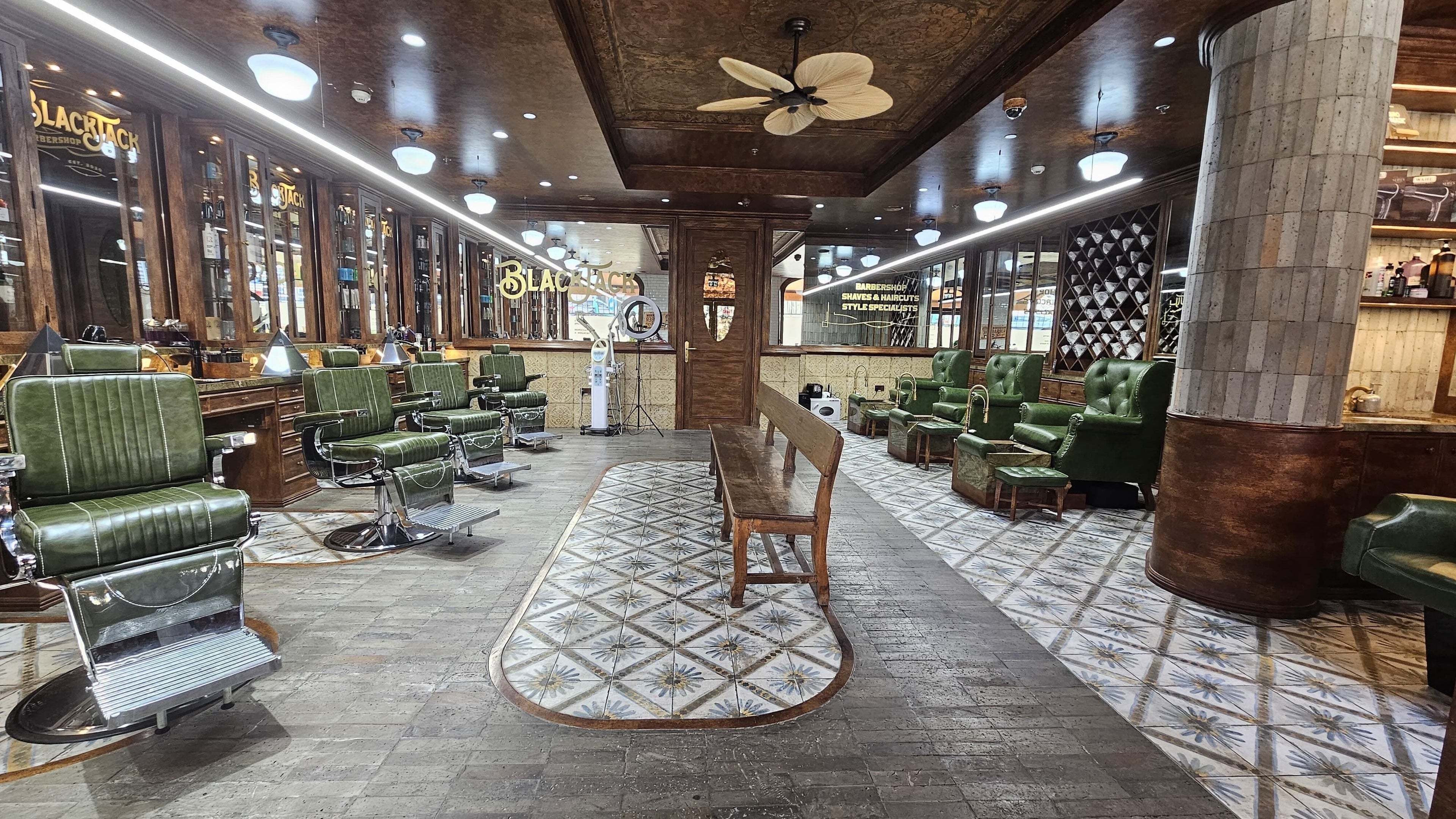 Interior of JBR BlackJack Barbershop with vintage chairs in Dubai, Dubai, AE.