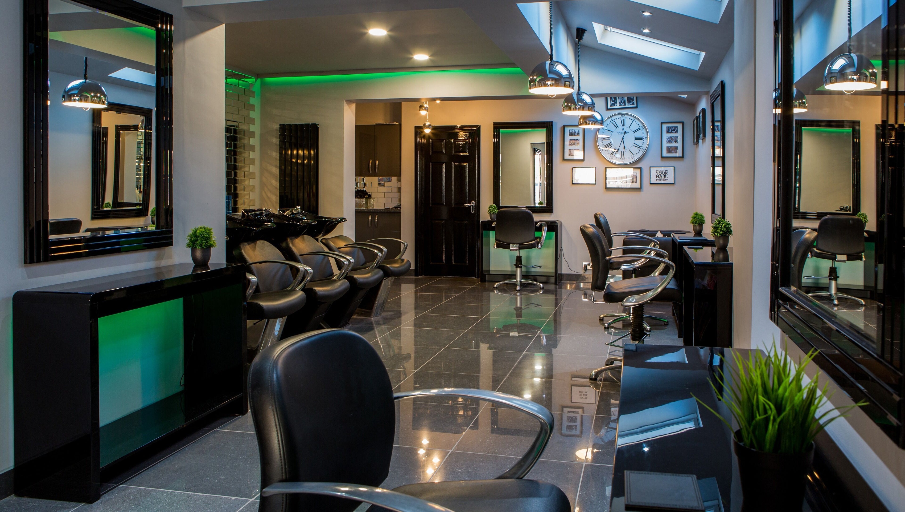 Elegant interior of CODE Hair Consultants in Lowestoft, England, GB, showcasing modern salon chairs and decor.