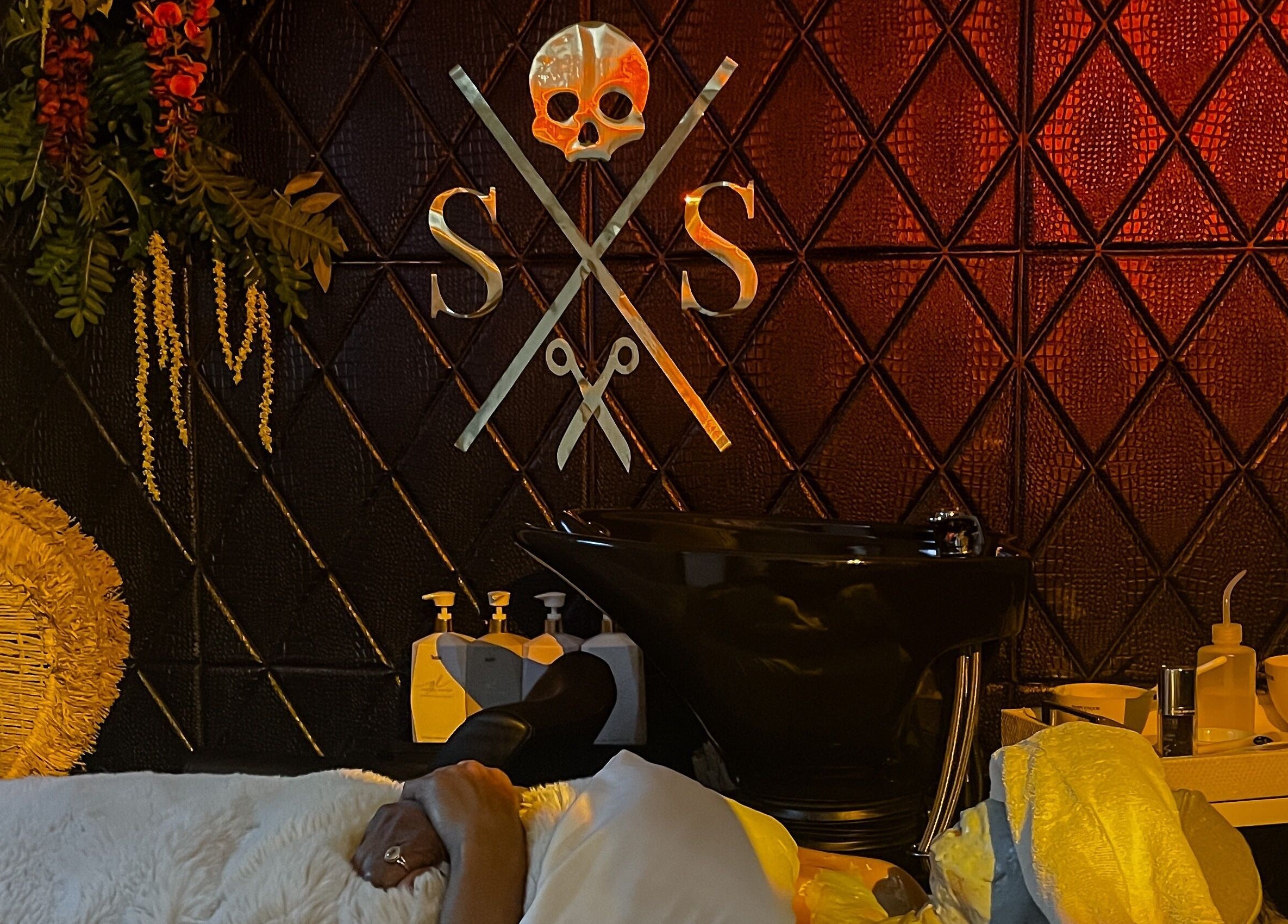 Luxurious space at Skin and Scissors Beauty Studio, Orange, California, US featuring a plush spa setup.