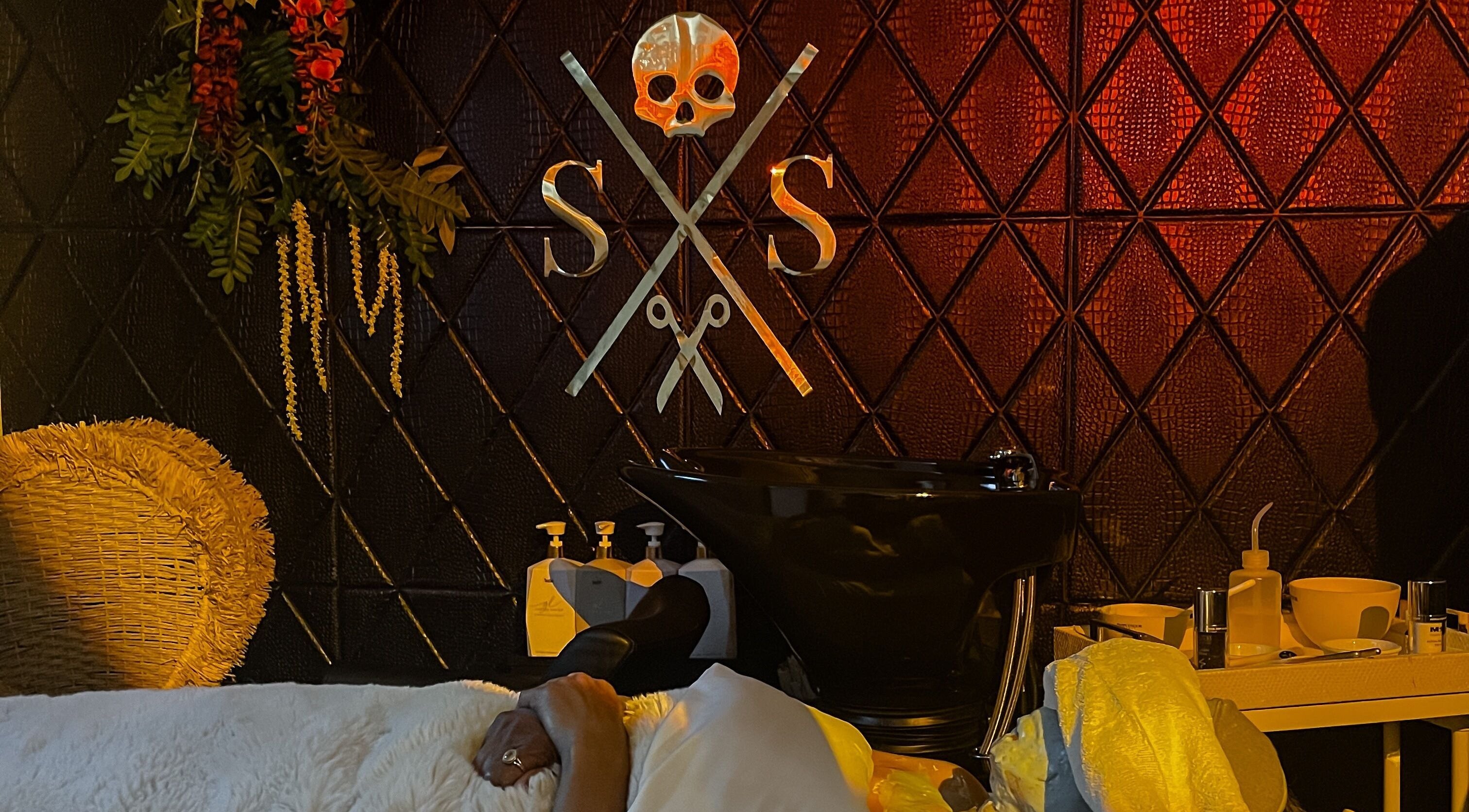 Luxurious space at Skin and Scissors Beauty Studio, Orange, California, US featuring a plush spa setup.