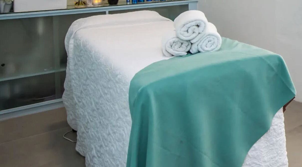 Serene massage bed setup at Flourish Salon in Durban North, KwaZulu-Natal, ZA, ready for a calming experience.