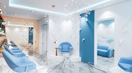Chic interior of Cloud Eleven Beauty Salon in Dubai, Dubai, AE, with modern blue and white decor.
