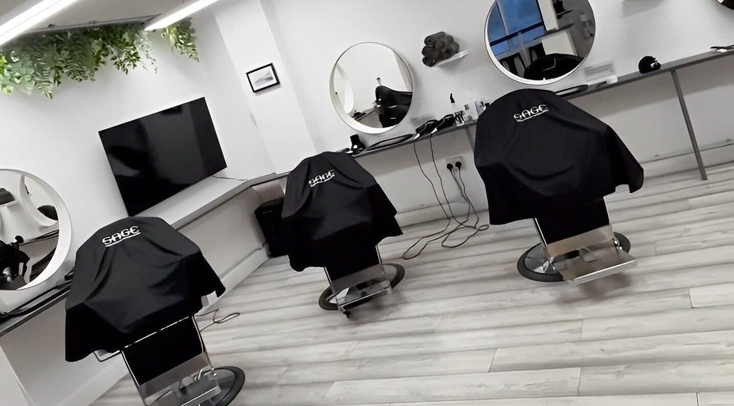 Modern interior of Sage Hair Care - Fairwater, Cardiff in Cardiff, Wales, GB with stylish salon chairs.