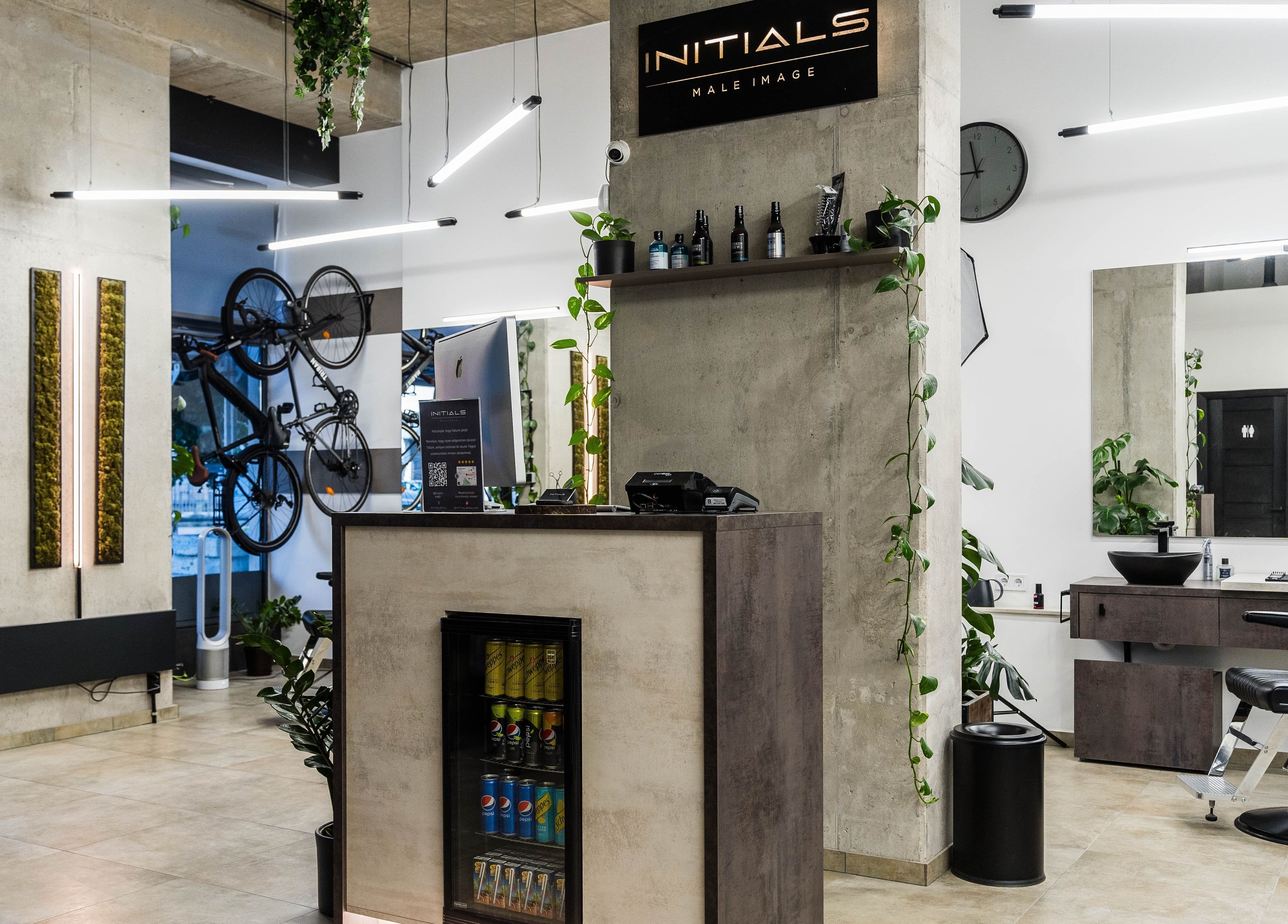 Modern interior of Initials, a beauty venue in Budapest, Magyar, HU, featuring sleek decor and stylish setups.