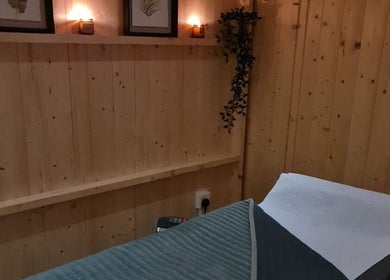 Cozy treatment room at ELC Aesthetics, Beauty & Training, Lurgan, Northern Ireland, GB with dim lighting and decor.