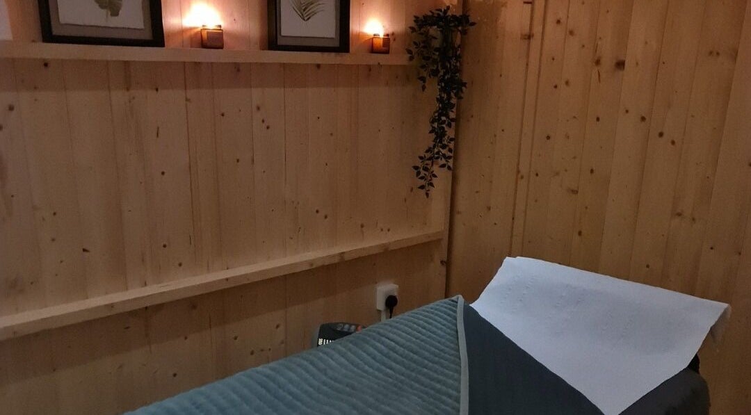 Cozy treatment room at ELC Aesthetics, Beauty & Training, Lurgan, Northern Ireland, GB with dim lighting and decor.