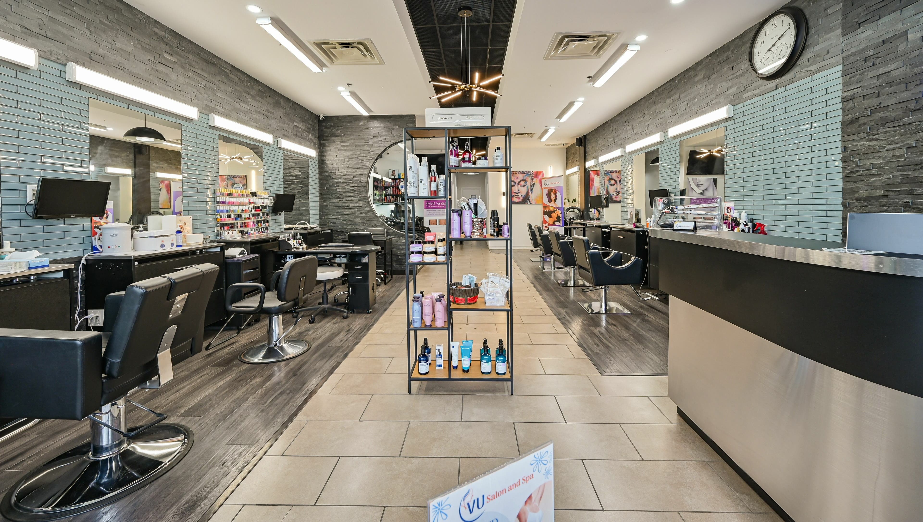 Interior of VU Salon and Spa in Mississauga, Ontario, CA showcasing a stylish and modern salon setup.