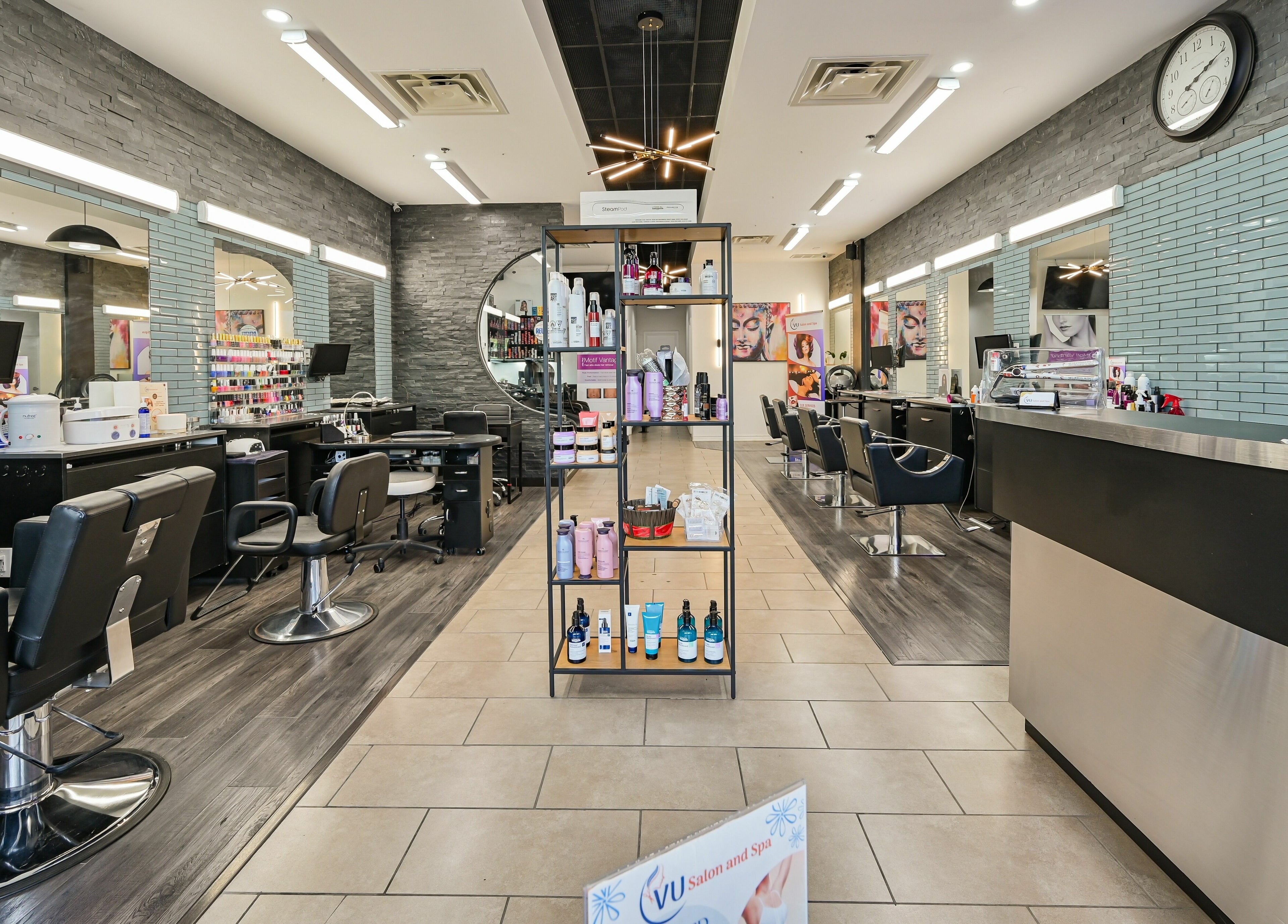 Interior of VU Salon and Spa in Mississauga, Ontario, CA showcasing a stylish and modern salon setup.