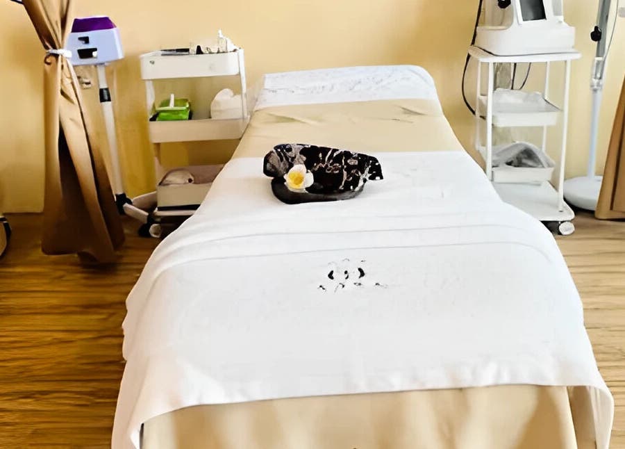 Spa room at Aora Spa and Wellness Jitra, Jitra, Kedah, MY, featuring a massage table and soothing ambiance.