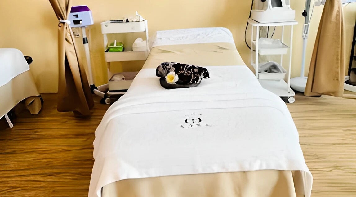Spa room at Aora Spa and Wellness Jitra, Jitra, Kedah, MY, featuring a massage table and soothing ambiance.