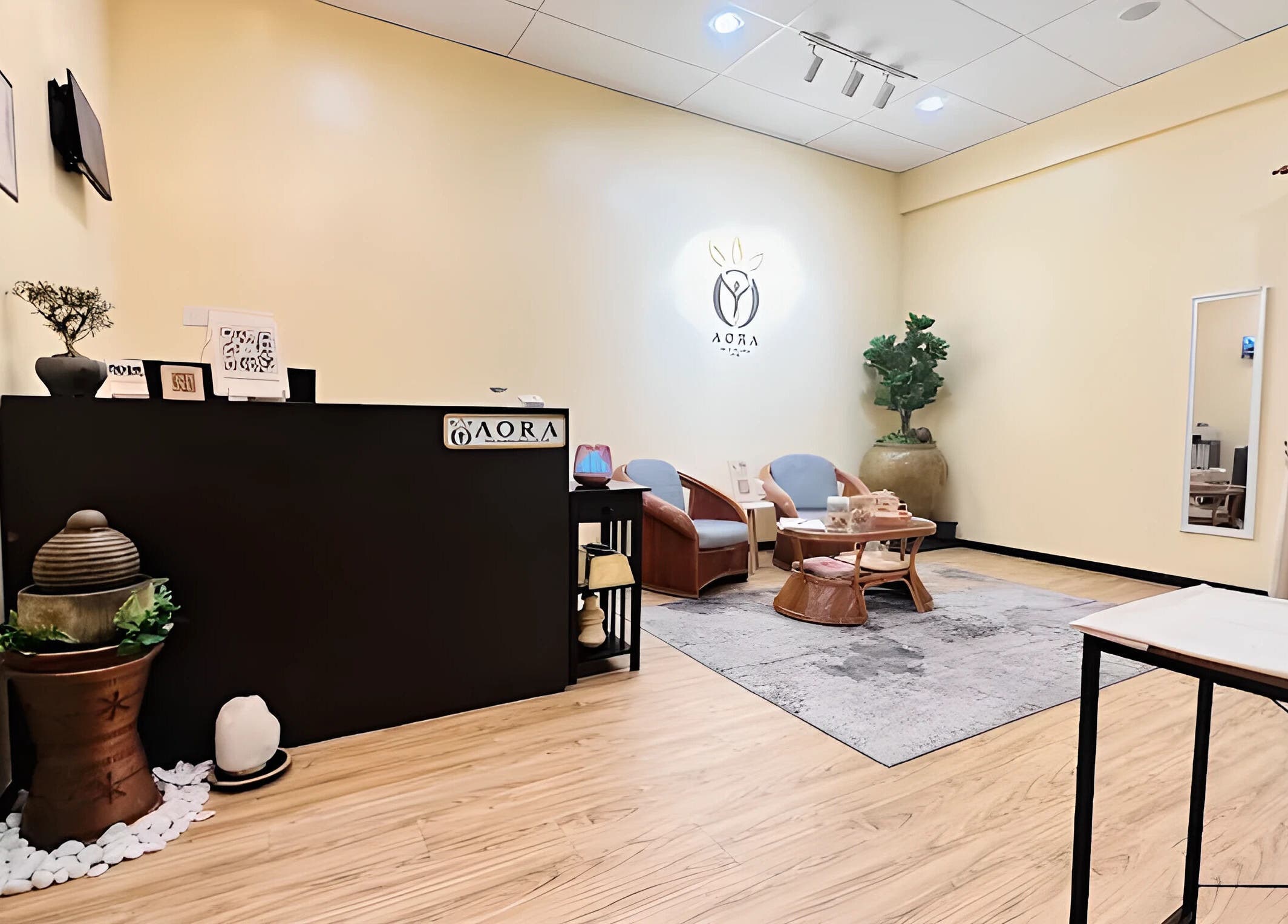 Elegant reception area at Aora Spa and Wellness Jitra in Jitra, Kedah, MY, featuring cozy seating and calm ambiance.