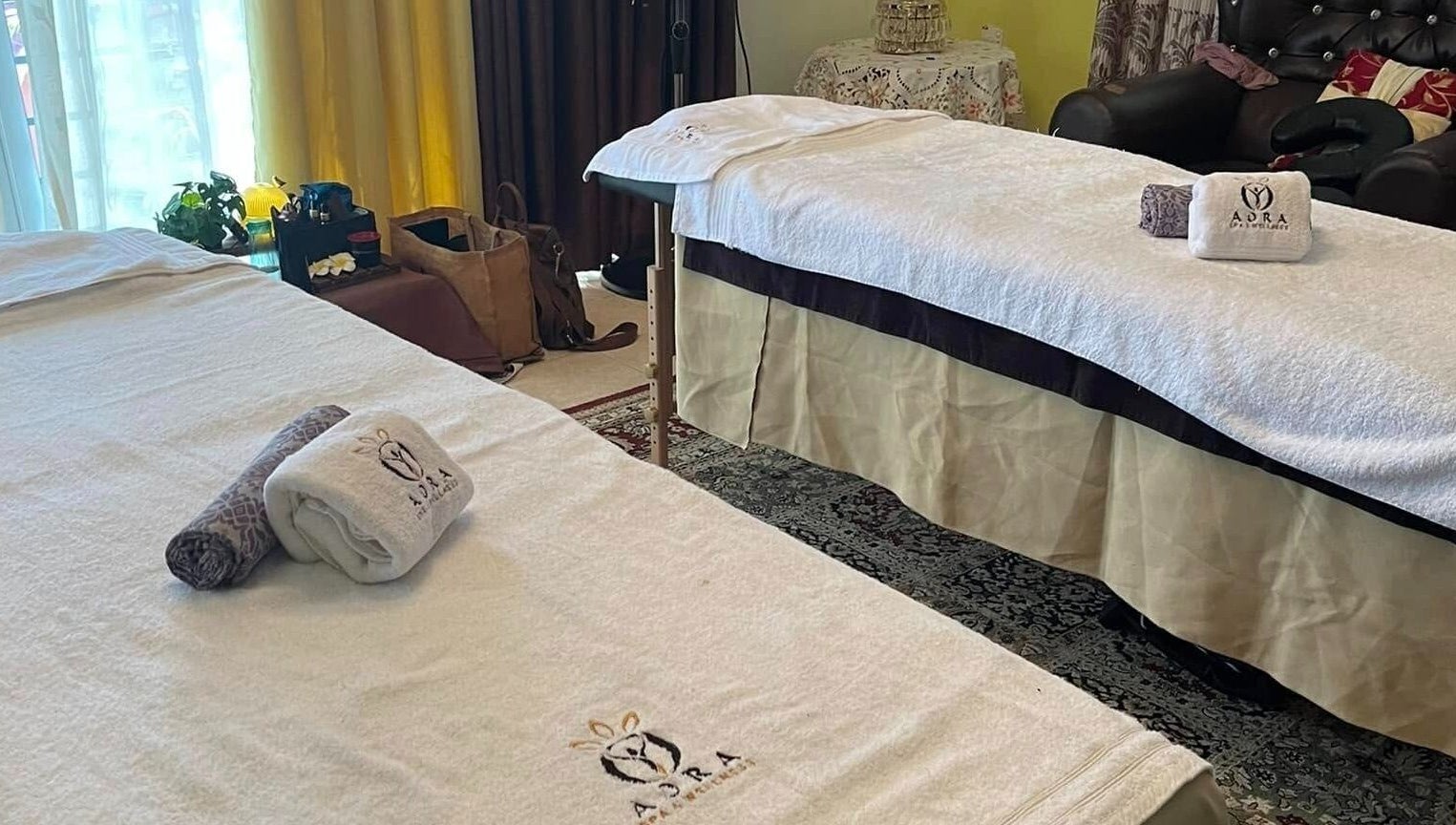 Relaxing spa room at Aora Spa and Wellness - Lumut, featuring massage beds, Lumut, Perak, MY.