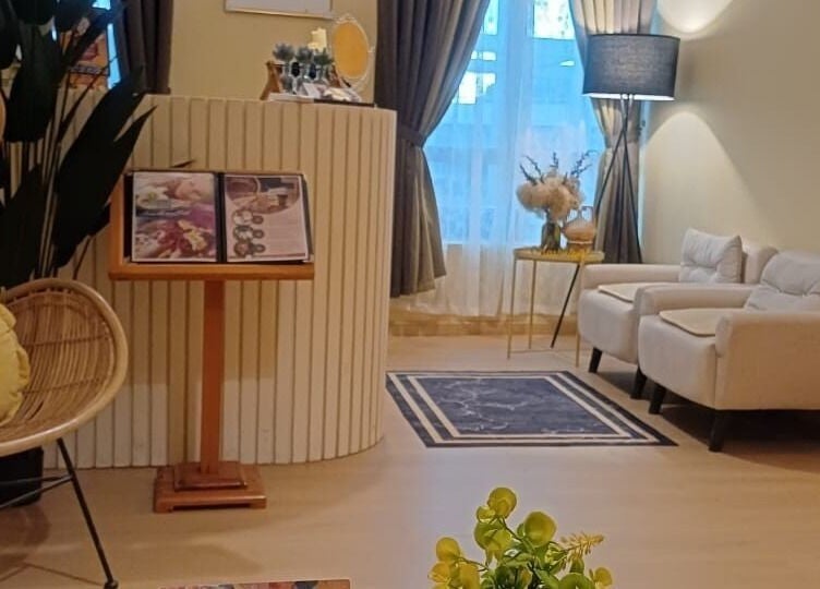 Relaxing reception area at Aora Spa & Wellness Shah Alam, Shah Alam, Selangor, MY with plush seating and decor.