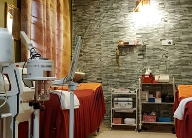 Cozy treatment room at AORA Spa and Wellness Sungai Petani, Kedah, MY with modern equipment and soothing decor.