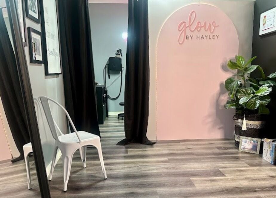 Chic interior of Glow by Hayley salon in Kellyville, New South Wales, AU with stylish decor and beauty products.