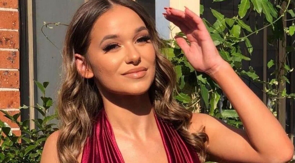 A woman enjoying sunlight at Glow by Hayley in Kellyville, New South Wales, AU for beauty and wellness.