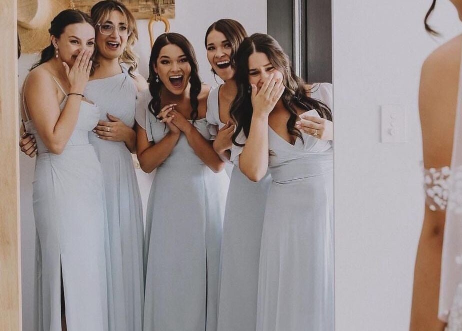 Bridesmaids joyfully reacting to the bride at Glow by Hayley, Kellyville, New South Wales, AU.