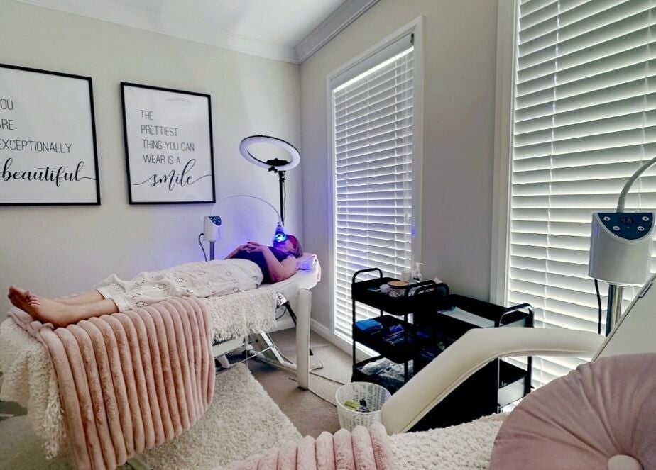 Glow by Hayley facial room in Kellyville, New South Wales, AU with a client receiving treatment in a tranquil setting.