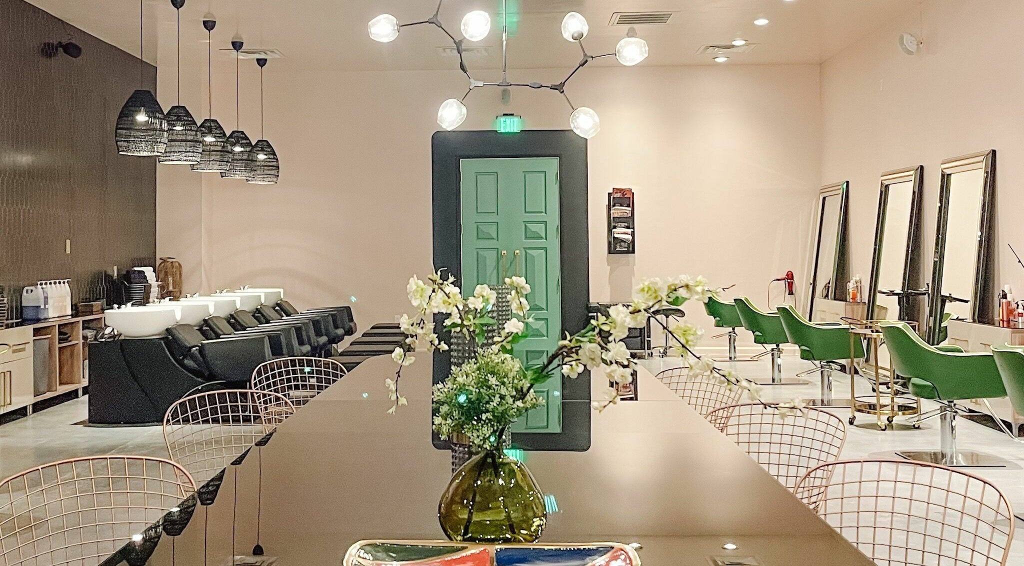 Modern interior of Capelli Salon in Dallas, Texas, US featuring stylish chairs and elegant decor.