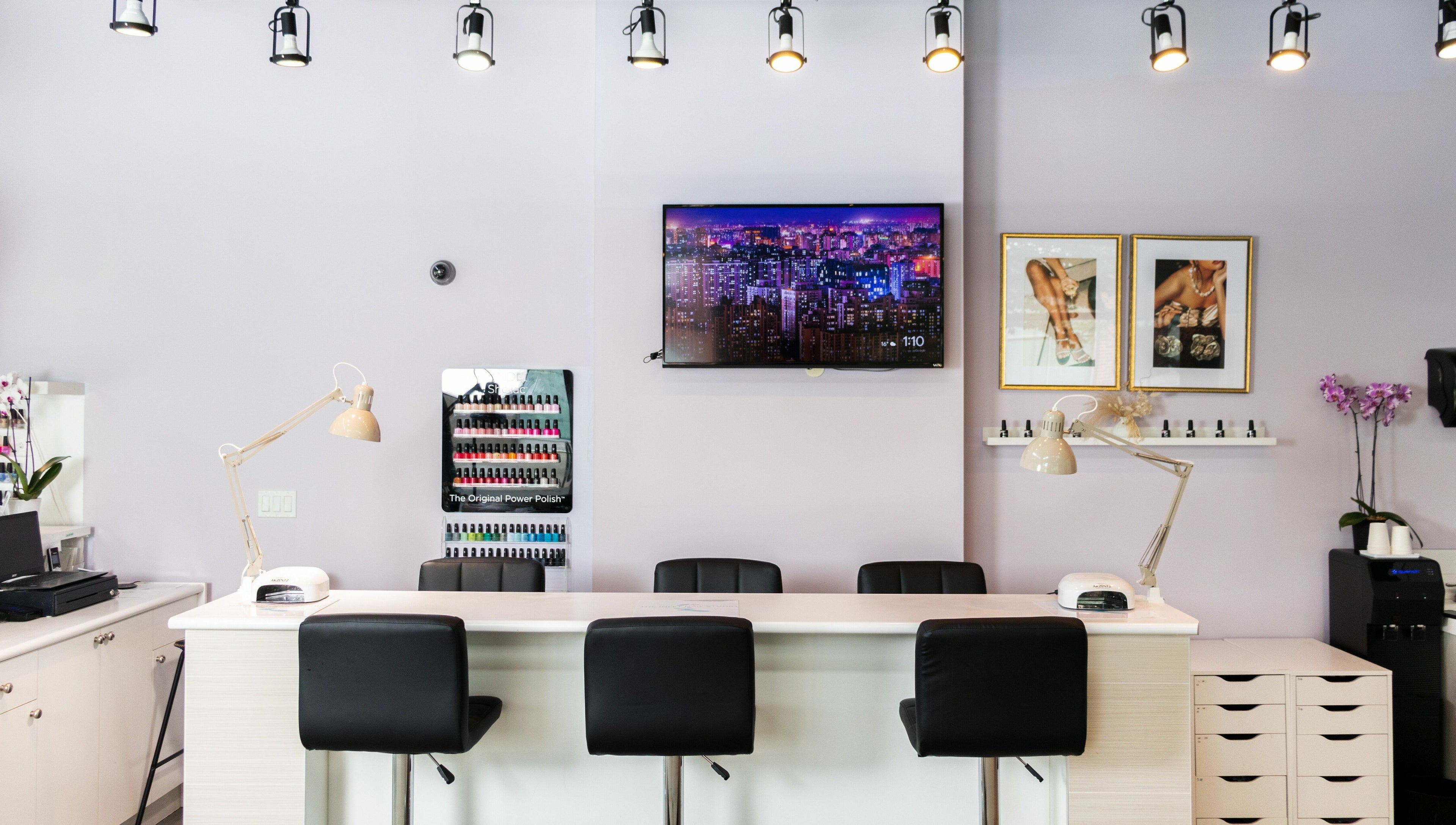 Modern interior of The Inlet Nail Studio in Port Moody, British Columbia, CA with stylish decor and nail polish display.