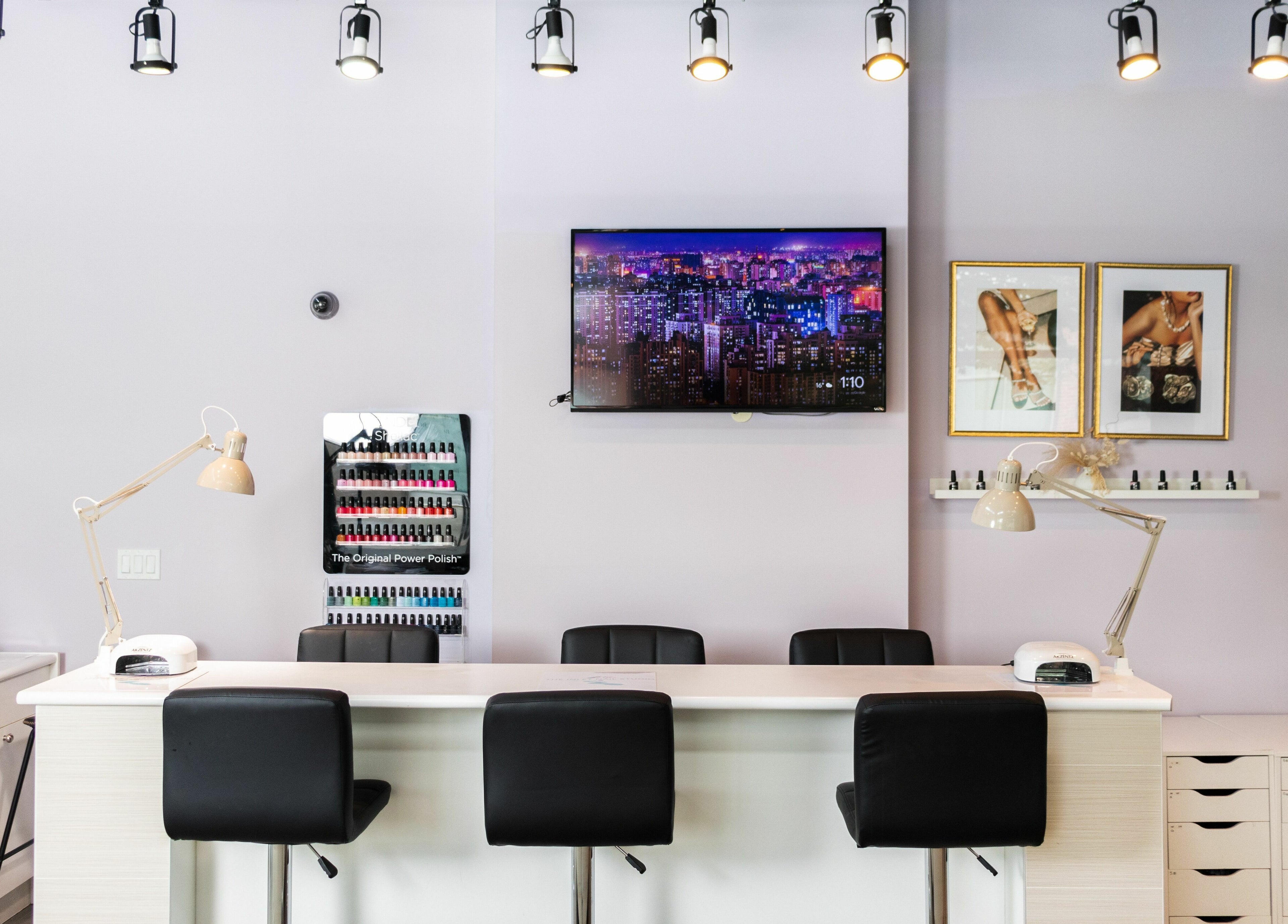 Modern interior of The Inlet Nail Studio in Port Moody, British Columbia, CA with stylish decor and nail polish display.