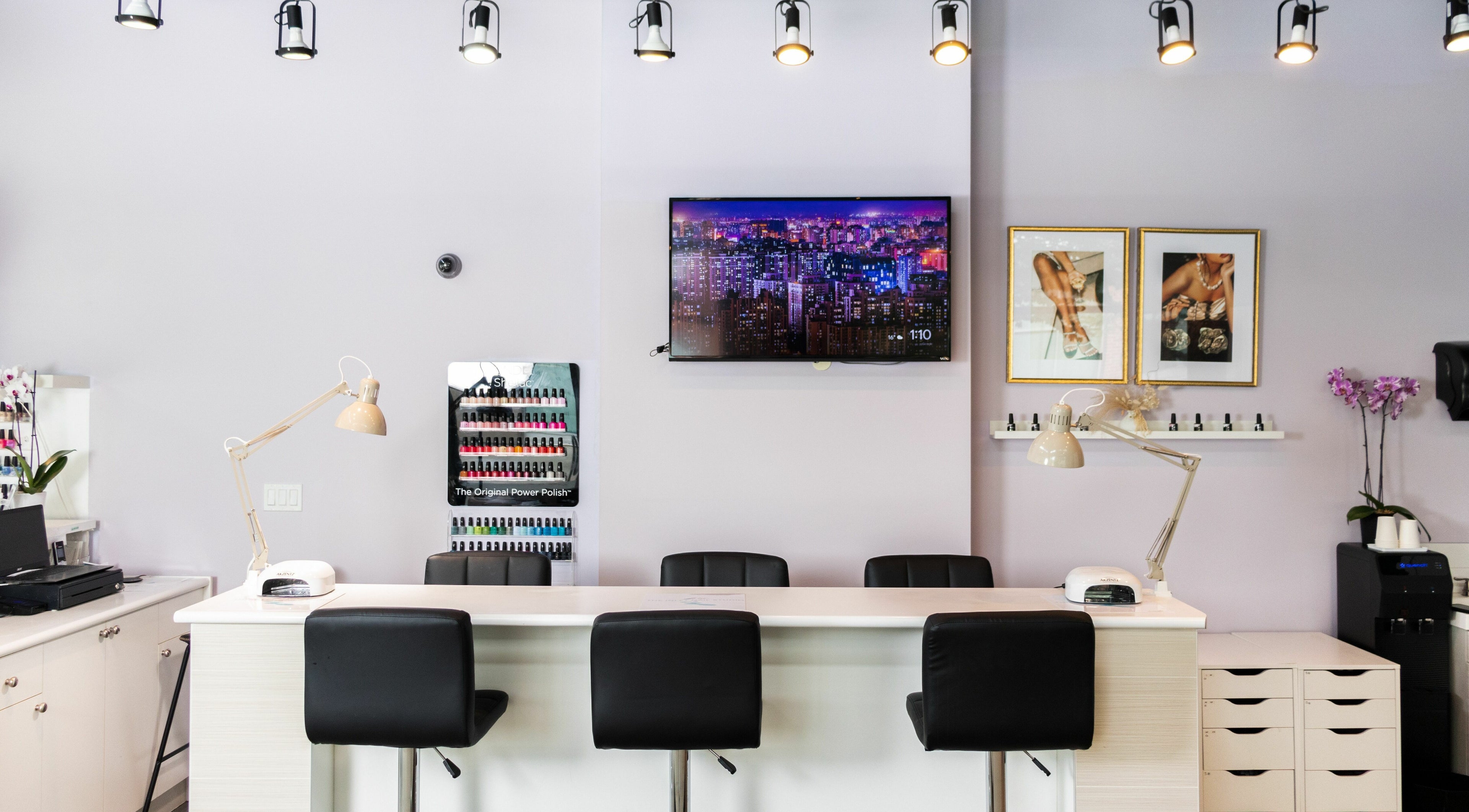 Modern interior of The Inlet Nail Studio in Port Moody, British Columbia, CA with stylish decor and nail polish display.