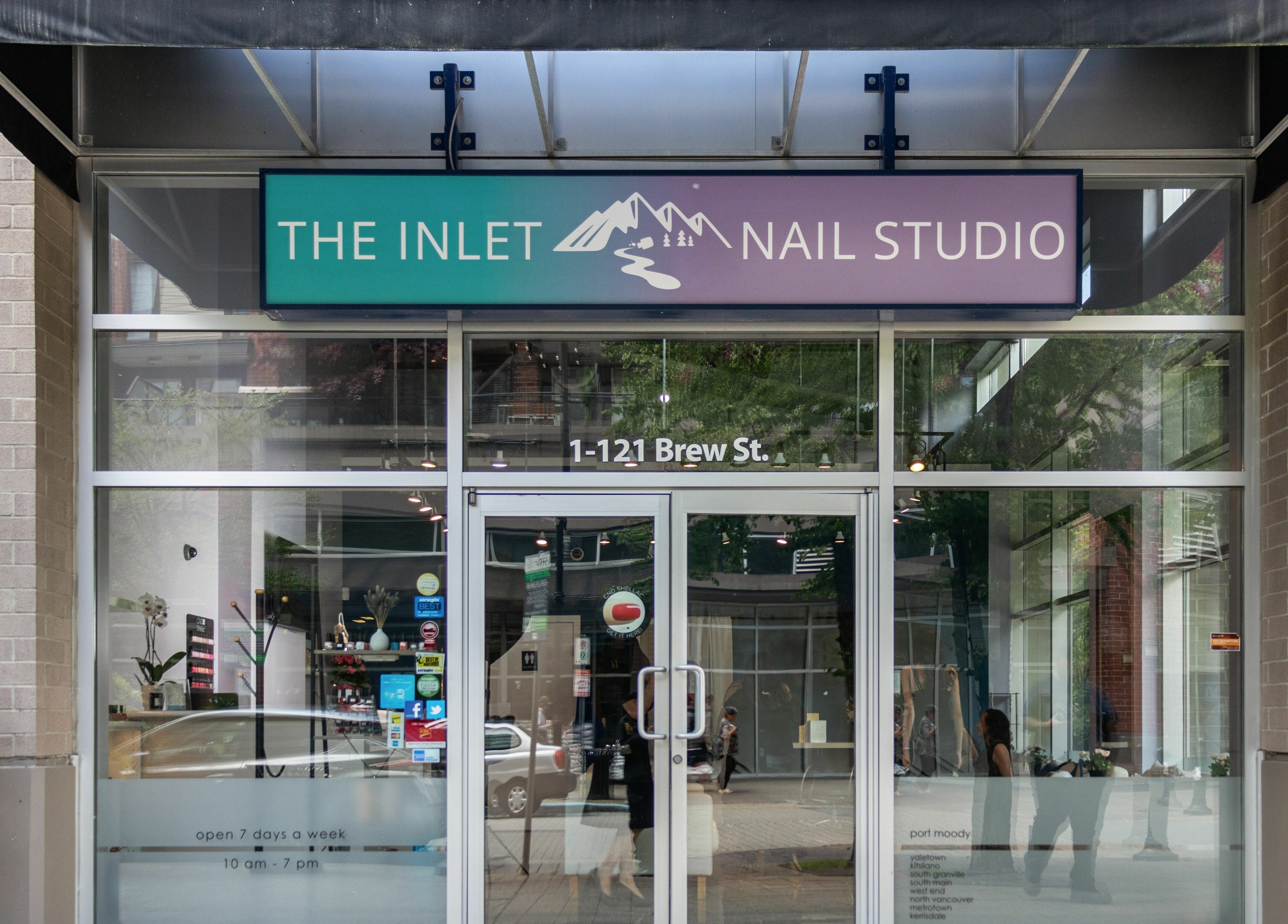 Main entrance of The Inlet Nail Studio, Port Moody, British Columbia, CA, showcasing a sleek and inviting facade.