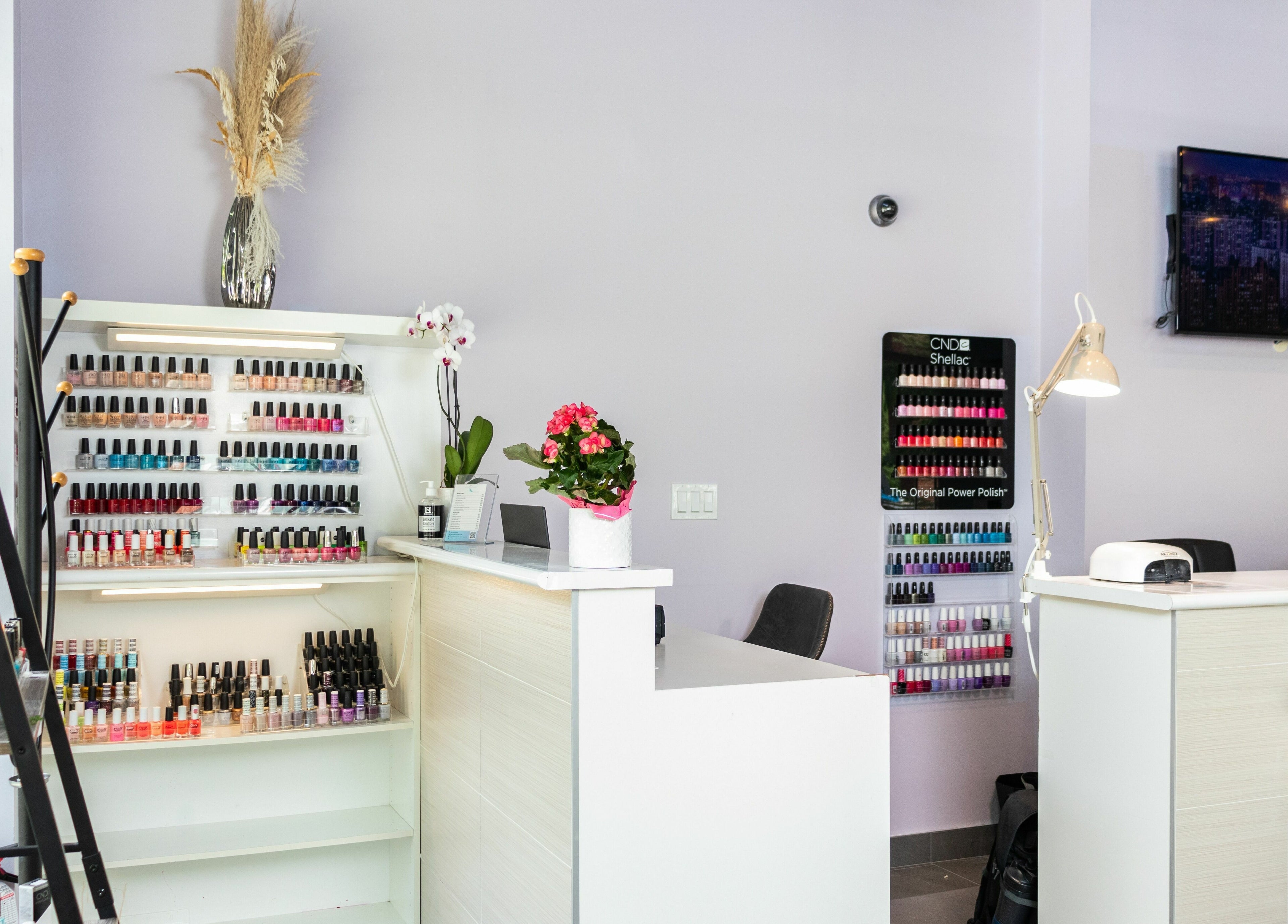Vibrant nail polish display at The Inlet Nail Studio in Port Moody, British Columbia, CA offering diverse colors.