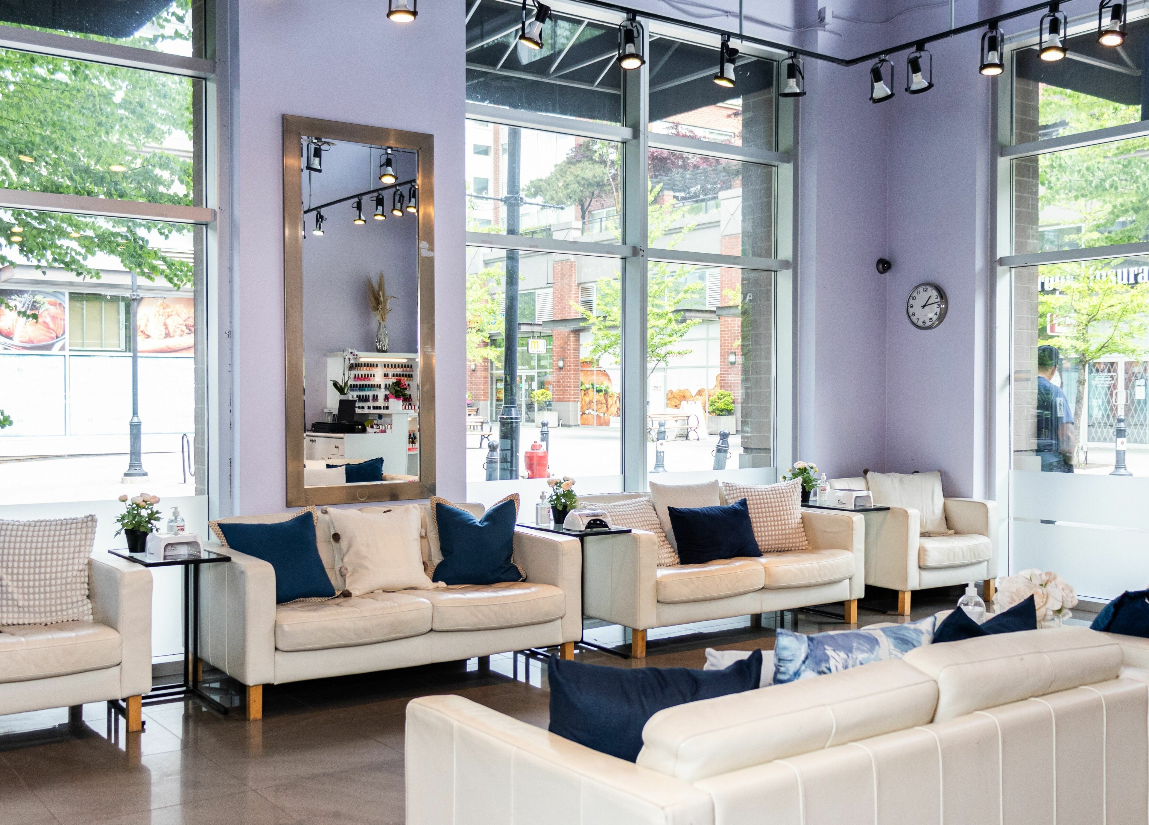 Elegant seating area at The Inlet Nail Studio in Port Moody, British Columbia, CA with sophisticated decor.