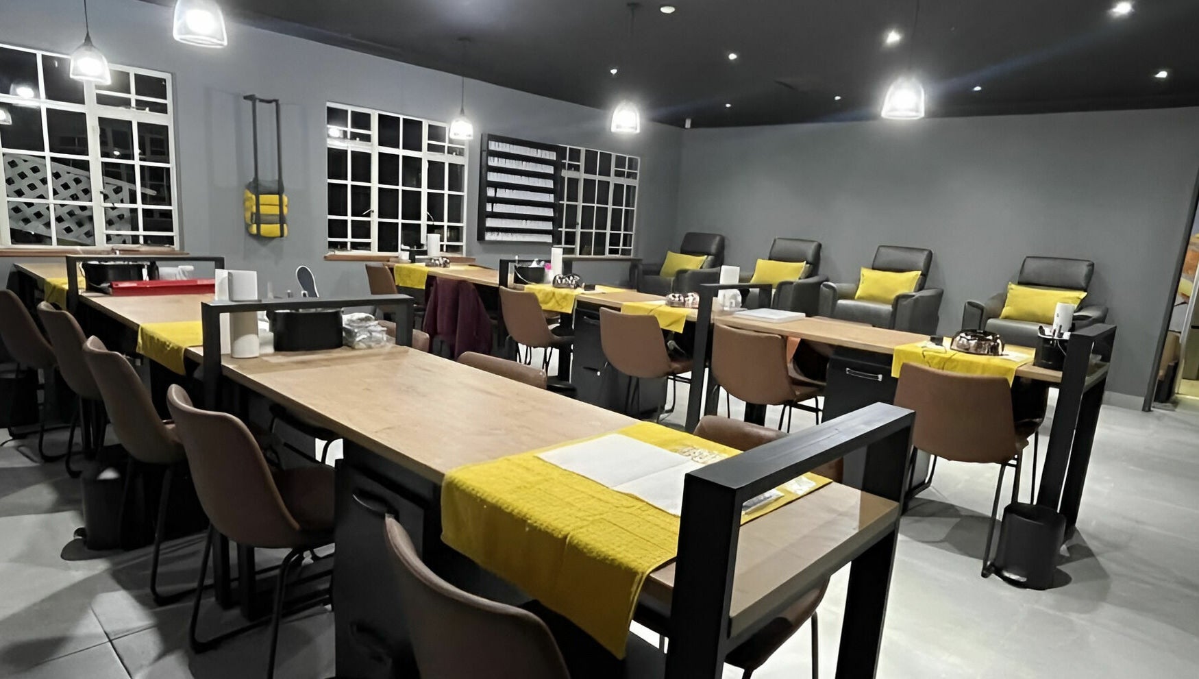 Modern interior of Giggles n Kurls Nail Studio Midrand in Midrand, Gauteng, ZA showcasing stylish nail stations.