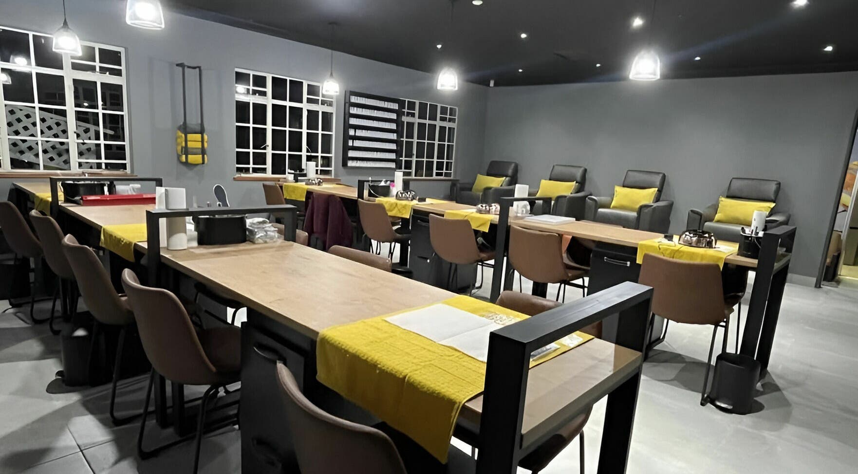 Modern interior of Giggles n Kurls Nail Studio Midrand in Midrand, Gauteng, ZA showcasing stylish nail stations.