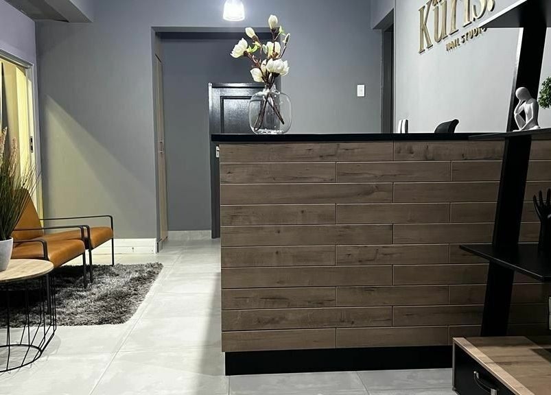 Sleek reception area at Giggles n Kurls Nail Studio Midrand, showcasing modern decor in Midrand, Gauteng, ZA.