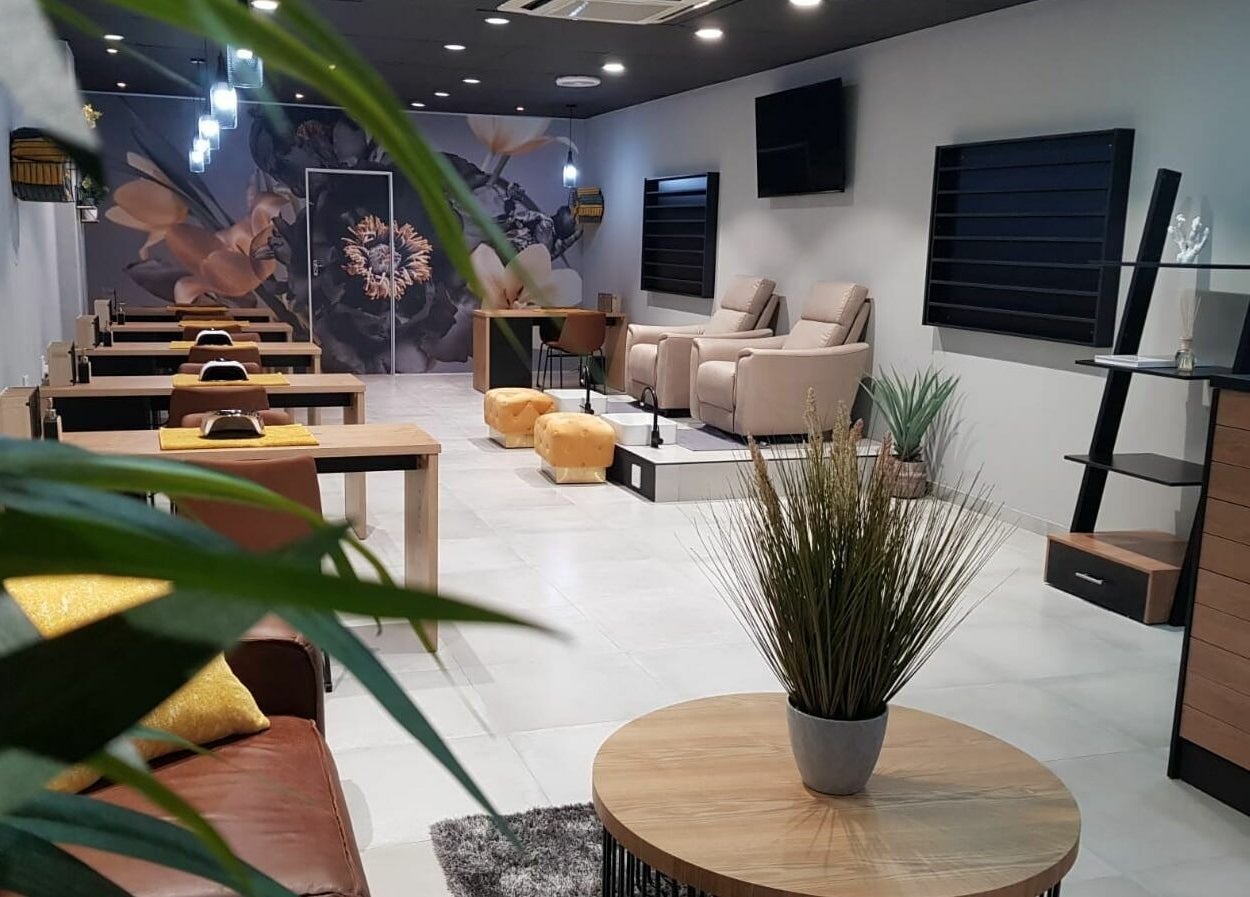 Interior of Giggles n Kurls Nail Studio Bryanston, Sandton, Gauteng, ZA, featuring modern decor and nail stations.